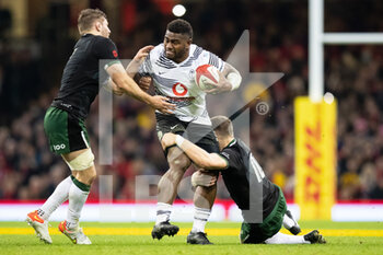 2021-11-14 - Josua Tuisova of Fiji under pressure from Thomas Young of Wales during the Autumn Nations Series 2021, rugby union test match between Wales and Fiji on November 14, 2021 at Principality Stadium in Cardiff, Wales - TEST MATCH 2021 - WALES VS FIJI - AUTUMN NATIONS SERIES - RUGBY