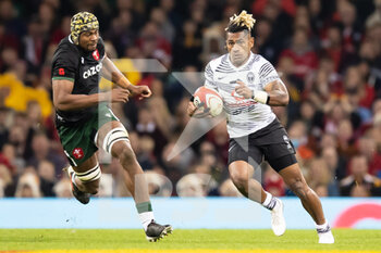 2021-11-14 - Nikola Matawalu of Fiji and Christ Tshiunza of Wales during the Autumn Nations Series 2021, rugby union test match between Wales and Fiji on November 14, 2021 at Principality Stadium in Cardiff, Wales - TEST MATCH 2021 - WALES VS FIJI - AUTUMN NATIONS SERIES - RUGBY