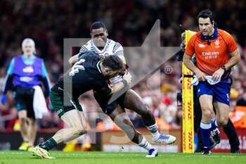 2021-11-14 - Aminiasi Tuimaba of Fiji is tackled by Alex Cuthbert of Wales during the Autumn Nations Series 2021, rugby union test match between Wales and Fiji on November 14, 2021 at Principality Stadium in Cardiff, Wales - TEST MATCH 2021 - WALES VS FIJI - AUTUMN NATIONS SERIES - RUGBY