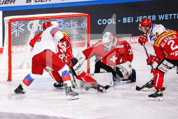 2021-11-11 - 11.11.2021, Krefeld,  Yayla Arena, Deutschland Cup: Slovakia - Switzerland, #35 Ludovic Waeber (Switzerland) saves 
#16 Yegor Bryzgalov (Russia) fighting with #65 Ramon Untersander (Switzerland) for the puck and #2 Santeri Alatalo (Switzerland) try to stop #79 Dmitri Ovchinnikov (Russia) - DEUTSCHLAND CUP 2021 - SLOVAKIA VS SWITZERLAND - ICE HOCKEY - WINTER SPORTS