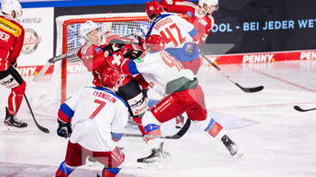 2021-11-14 - 14.11.2021, Krefeld,  Yayla Arena, Deutschland Cup: Switzerland - Russia, #46 Nikita Dynyak (Russia) pushes #75 Nando Eggenberger (Switzerland) - DEUTSCHLAND CUP2021 : SWITZERLAND VS RUSSIA - ICE HOCKEY - WINTER SPORTS