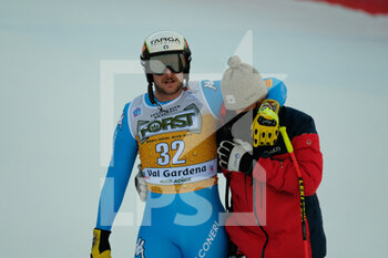 2021-12-18 - Emanuele Buzzi (ITA) crash at the last jump immediately before the finish line. - 2021 FIS SKI WORLD CUP - MEN'S DOWNHILL - ALPINE SKIING - WINTER SPORTS