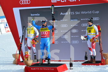 2021-12-28 - Dominik Paris (winner) Cerimony - 2021 FIS SKI WORLD CUP - MEN'S DOWN HILL - ALPINE SKIING - WINTER SPORTS