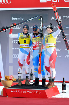 2021-12-28 - Dominik Paris (winner) cerimony - 2021 FIS SKI WORLD CUP - MEN'S DOWN HILL - ALPINE SKIING - WINTER SPORTS