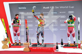2021-12-29 - Podium winners - 2021 FIS SKI WORLD CUP - MEN'S SUPER GIANT - ALPINE SKIING - WINTER SPORTS