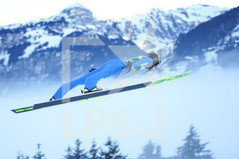 2021-12-18 - December 18, 2021, Engelberg, Gross-Titlis-Schanze, FIS Ski Jumping World Cup Engelberg, Daniel Tschofenig AUT jumps from the hill (in action); Mountain and fog in the background - 2021 FIS SKI JUMPING WORLD CUP - NORDIC SKIING - WINTER SPORTS