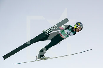2021-12-18 - December 18, 2021, Engelberg, Gross-Titlis-Schanze, FIS Ski Jumping World Cup Engelberg, Anze Lanisek SLO jumps off the hill, in action - 2021 FIS SKI JUMPING WORLD CUP - NORDIC SKIING - WINTER SPORTS