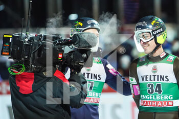 2021-12-18 - December 18, 2021, Engelberg, Gross-Titlis-Schanze, FIS Ski Jumping World Cup Engelberg, Timi Zajc SLO smiles into the camera - 2021 FIS SKI JUMPING WORLD CUP - NORDIC SKIING - WINTER SPORTS