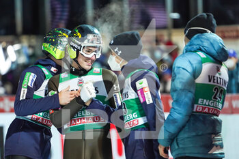 2021-12-18 - December 18, 2021, Engelberg, Gross-Titlis-Schanze, FIS Ski Jumping World Cup Engelberg, Timi Zajc SLO is congratulated - 2021 FIS SKI JUMPING WORLD CUP - NORDIC SKIING - WINTER SPORTS