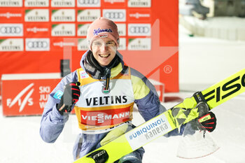 2021-12-18 - December 18, 2021, Engelberg, Gross-Titlis-Schanze, FIS Ski Jumping World Cup Engelberg, Karl Geiger GER celebrates victory at the award ceremony - 2021 FIS SKI JUMPING WORLD CUP - NORDIC SKIING - WINTER SPORTS