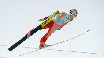 2021-12-19 - 19.12.2021, Engelberg, Gross-Titlis-Schanze, FIS Ski Jumping World Cup Engelberg, Kilian Peier (SUI) jumps off the hill, in action - FIS SKI JUMPING WORLD CUP 2021 - NORDIC SKIING - WINTER SPORTS