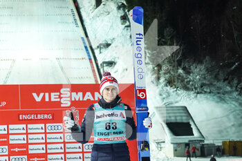 2021-12-19 - December 19, 2021, Engelberg, Gross-Titlis-Schanze, FIS Ski Jumping World Cup Engelberg, Marius Lindvik (NOR) celebrates third place at the award ceremony - FIS SKI JUMPING WORLD CUP 2021 - NORDIC SKIING - WINTER SPORTS