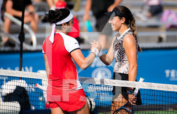 2021-09-30 - Ons Jabeur of Tunisia & Jessica Pegula of the United States at the net after the third round of the 2021 Chicago Fall Tennis Classic WTA 500 tennis tournament on September 30, 2021 in Chicago, USA - 2021 CHICAGO FALL TENNIS CLASSIC WTA 500 TENNIS TOURNAMENT - INTERNATIONALS - TENNIS