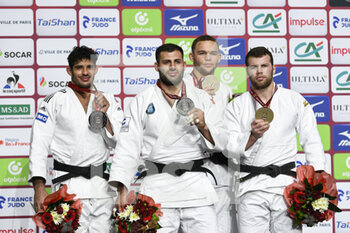 2021-10-17 - Men -100 kg, GONZALEZ Asley (ROU) Silver medal, ADAMIAN Arman (RUS) Gold medal, CATHARINA Simeon (NED) and SANEBLIDZE Onise (GEO) Bronze medal during the podium ceremony of the Paris Grand Slam 2021, Judo event on October 17, 2021 at AccorHotels Arena in Paris, France - PARIS GRAND SLAM 2021, JUDO EVENT - INTERNATIONALS - TENNIS