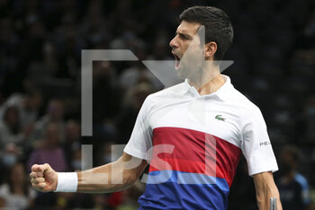 2021-11-01 - Novak Djokovic of Serbia celebrates a point during his double match on day 1 of the Rolex Paris Masters 2021, an ATP Masters 1000 tennis tournament on November 1, 2021 at Accor Arena in Paris, France - ROLEX PARIS MASTERS 2021, AN ATP MASTERS 1000 TENNIS TOURNAMENT - INTERNATIONALS - TENNIS