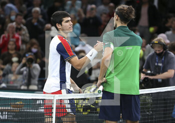 2021-11-02 - Carlos Alcaraz of Spain shakes hands with Pierre-Hughes Herbert of France after his victory during day 2 of the Rolex Paris Masters 2021, an ATP Masters 1000 tennis tournament on November 2, 2021 at Accor Arena in Paris, France - ROLEX PARIS MASTERS 2021, AN ATP MASTERS 1000 TENNIS TOURNAMENT - INTERNATIONALS - TENNIS