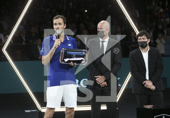 2021-11-07 - Finalist Daniil Medvedev of Russia, Tournament Director Guy Forget, trophy presenter Sebastien Grosjean during the trophy ceremony of the Rolex Paris Masters 2021 Final, an ATP Masters 1000 tennis tournament on November 7, 2021 at Accor Arena in Paris, France - ROLEX PARIS MASTERS 2021 FINAL, AN ATP MASTERS 1000 TENNIS TOURNAMENT - INTERNATIONALS - TENNIS