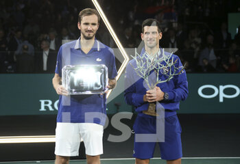 2021-11-07 - Finalist Daniil Medvedev of Russia, winner Novak Djokovic of Serbia during the trophy ceremony of the Rolex Paris Masters 2021 Final, an ATP Masters 1000 tennis tournament on November 7, 2021 at Accor Arena in Paris, France - ROLEX PARIS MASTERS 2021 FINAL, AN ATP MASTERS 1000 TENNIS TOURNAMENT - INTERNATIONALS - TENNIS