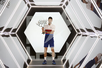 2021-11-07 - Novak Djokovic of Serbia poses with the trophy after winning the Rolex Paris Masters 2021 Final, an ATP Masters 1000 tennis tournament on November 7, 2021 at Accor Arena in Paris, France - ROLEX PARIS MASTERS 2021 FINAL, AN ATP MASTERS 1000 TENNIS TOURNAMENT - INTERNATIONALS - TENNIS