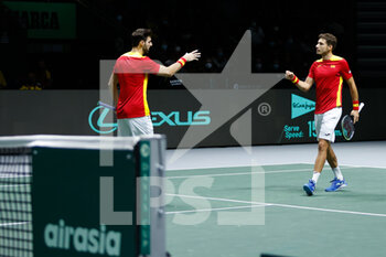 2021-11-26 - Pablo Carreno and Marcel Granollers of Spain during the Davis Cup 2021, Group A tennis third match between Spain and Ecuador on November 26, 2021 at Madrid Arena in Madrid, Spain - DAVIS CUP 2021, GROUP A - SPAIN VS ECUADOR - INTERNATIONALS - TENNIS