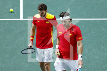 2021-11-28 - Feliciano Lopez and Marcel Granollers of Spain play doubles during the Davis Cup 2021, Group A tennis match between Spain and Russia on November 28, 2021 at Madrid Arena in Madrid, Spain - DAVIS CUP 2021, GROUP B - CANADA VS KAZAKHSTAN - INTERNATIONALS - TENNIS