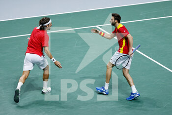 2021-11-28 - Feliciano Lopez and Marcel Granollers of Spain play doubles during the Davis Cup 2021, Group A tennis match between Spain and Russia on November 28, 2021 at Madrid Arena in Madrid, Spain - DAVIS CUP 2021, GROUP B - CANADA VS KAZAKHSTAN - INTERNATIONALS - TENNIS