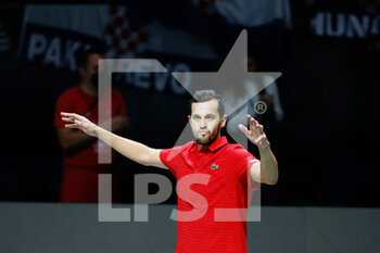 2021-12-03 - Mate Pavic of Croatia play doubles with Nikola Mektic and celebrates the victory during the semi-finals of the Davis Cup 2021, tennis match between Serbia and Croatia on December 3, 2021 at Madrid Arena in Madrid, Spain - SEMIFINALS OF THE DAVIS CUP 2021, SERBIA VS CROATIA - INTERNATIONALS - TENNIS