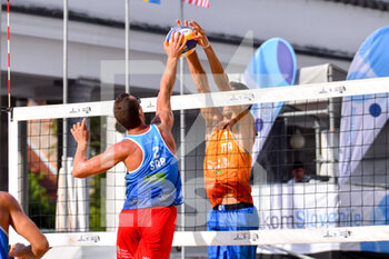 2021-07-31 - FIVB Beach Volleyball World Tour 1 Star Ljubljana: contrasto a rete tra Gianluca Dal Dorso (ITA) e Kolaric (SRB) - BEACH VOLLEY WORLD TOUR 2021 - BEACH VOLLEY - VOLLEYBALL