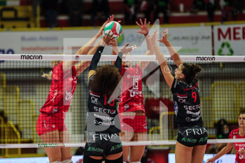 2021-10-20 - Valentina Diouf #13 of Bartoccini-Fortinfissi Perugia and Laura Melandri #9 of Bartoccini-Fortinfissi Perugia in action during the Volley Serie A women 2021/22 match between Unet E-Work Busto Arsizio vs Bartoccini-Fortinfissi Perugia at E-Work Arena on October 20, 2021 in Busto Arsizio, Italy - UNET E-WORK BUSTO ARSIZIO VS BARTOCCINI FORTINFISSI PERUGIA - SERIE A1 WOMEN - VOLLEYBALL