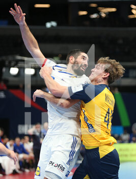 28/01/2022 - Nikola Karabatic of France and Karl Wallinius of Sweden during the EHF Euro 2022, Semi Final Handball match between France and Sweden on January 28, 2022 at Budapest Multifunctional Arena in Budapest, Hungary - EHF EURO 2022, SEMI FINAL - FRANCE VS SWEDEN - PALLAMANO - ALTRO