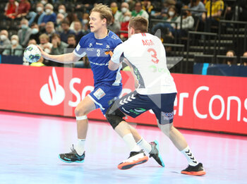 2022-01-28 - Janus Dadi Smarason of Iceland and Vetle Eck Aga of Norway during the EHF Euro 2022, Placement Match 5/6 Handball match between Iceland and Norway on January 28, 2022 at Budapest Multifunctional Arena in Budapest, Hungary - EHF EURO 2022, PLACEMENT MATCH 5/6 - ICELAND VS NORWAY - HANDBALL - OTHER SPORTS