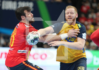 2022-01-30 - Jim Gottfridsson of Sweden and Gedeon Guardiola of Spain during the EHF Men's Euro, Final handball match between Sweden and Spain on January 30, 2022 at Budapest Multifunctional Arena in Budapest, Hungary - EHF MEN'S EURO 2022, FINAL - SWEDEN VS SPAIN - HANDBALL - OTHER SPORTS