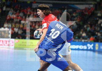 2022-01-30 - Jacob Holm of Denmark and Dika Mem of France during the EHF Men's Euro 2022, Placement Match 3/4 handball match between France and Denmark on January 30, 2022 at Budapest Multifunctional Arena in Budapest, Hungary - EHF MEN'S EURO 2022, PLACEMENT MATCH 3/4 - FRANCE VS DENMARK - HANDBALL - OTHER SPORTS