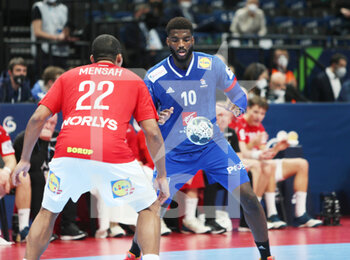 2022-01-30 - Dika Mem of France and Mads Mensah of Denmark during the EHF Men's Euro 2022, Placement Match 3/4 handball match between France and Denmark on January 30, 2022 at Budapest Multifunctional Arena in Budapest, Hungary - EHF MEN'S EURO 2022, PLACEMENT MATCH 3/4 - FRANCE VS DENMARK - HANDBALL - OTHER SPORTS