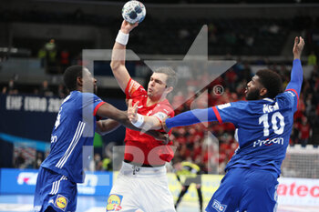 2022-01-30 - Rasmus Lauge of Denmark and Karl Konan, Dika Mem of France during the EHF Men's Euro 2022, Placement Match 3/4 handball match between France and Denmark on January 30, 2022 at Budapest Multifunctional Arena in Budapest, Hungary - EHF MEN'S EURO 2022, PLACEMENT MATCH 3/4 - FRANCE VS DENMARK - HANDBALL - OTHER SPORTS