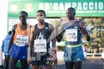 2022-01-06 - Addisu Yehune (Eth) first place, Kiplagat Emmanuel (Ken) second place and Serem Amos (Ken) third place - 2021 65TH CROSS COUNTRY CAMPACCIO INTERNATIONAL - INTERNATIONALS - ATHLETICS
