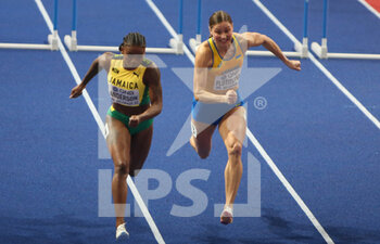 2022-03-19 - Britany ANDERSON of Jamaica and Anna PLOTITSYNA of Ukraine, Heats 60 M Hurdles Women during the World Athletics Indoor Championships 2022 on March 19, 2022 at Stark Arena in Belgrade, Serbia - WORLD ATHLETICS INDOOR CHAMPIONSHIPS 2022 - INTERNATIONALS - ATHLETICS