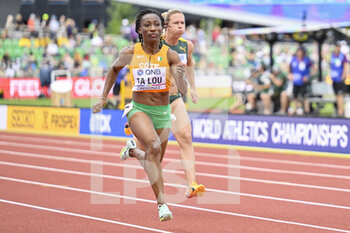 2022-07-16 - Marie-Josee Ta Lou of Ivory Coast competing on Women's heats 100 metres during the World Athletics Championships on July 16, 2022 in Eugene, United States - ATHLETICS - WORLD CHAMPIONSHIPS 2022 - INTERNATIONALS - ATHLETICS