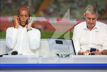 2022-08-15 - France Television consultant Stephane Diagana and France Television journalist Alexandre Pasteur at the European Championships Munich 2022 on August 15, 2022 in Munich, Germany - EUROPEAN CHAMPIONSHIPS MUNICH 2022 - INTERNATIONALS - ATHLETICS