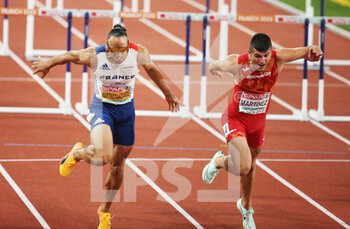 2022-08-17 - Pascal Martinot-Lagarde of France Silver medal, Asier Martinez of Spain Gold medal during the Athletics, Men's 110m Hurdles at the European Championships Munich 2022 on August 17, 2022 in Munich, Germany - EUROPEAN CHAMPIONSHIPS MUNICH 2022 - INTERNATIONALS - ATHLETICS
