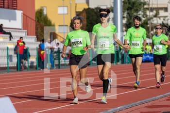 02/10/2022 - Maria Cristina Luisani and Sandra Inverardi with their guides during 5000m T11-T12 race - ITALIAN PARATHLETICS CHAMPIONSHIPS - NATIONAL FINALS - NAZIONALI - ATLETICA
