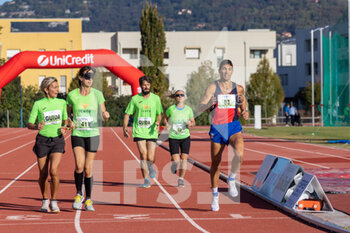 02/10/2022 - Fabrizio Vallone, Sandra Inverardi and Maria Cristina Luisani with their guides during 5000m race - ITALIAN PARATHLETICS CHAMPIONSHIPS - NATIONAL FINALS - NAZIONALI - ATLETICA