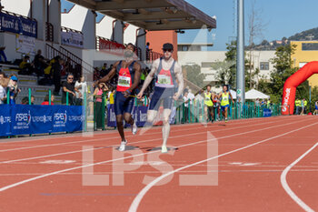 02/10/2022 - Niccolò Pirosu and his guide during 200m sprint - ITALIAN PARATHLETICS CHAMPIONSHIPS - NATIONAL FINALS - NAZIONALI - ATLETICA