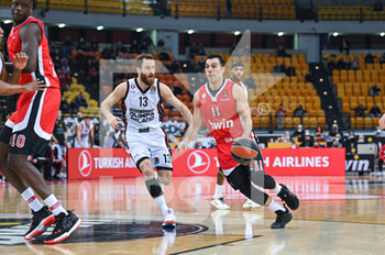 2022-02-24 - Kostas Sloukas of Olympiacos BC in action against Sergio Rodriguez of AX Armani Exchange Milan during the Turkish Airlines EuroLeague Round 27 basketball match between Olympiacos BC and Ax Armani Exchange Milano on Feb 24, 2022 at Peace and Friendship Stadium in Athens, Greece - OLYMPIACOS VS AX ARMANI EXCHANGE MILANO - EUROLEAGUE - BASKETBALL