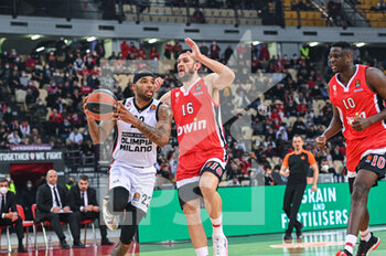 2022-02-24 - Malcolm Delaney of Ax Armani Exchange Milano in action against Kostas Papanikolaou of Olympiacos BC during the Turkish Airlines EuroLeague Round 27 basketball match between Olympiacos BC and Ax Armani Exchange Milano on Feb 24, 2022 at Peace and Friendship Stadium in Athens, Greece - OLYMPIACOS VS AX ARMANI EXCHANGE MILANO - EUROLEAGUE - BASKETBALL
