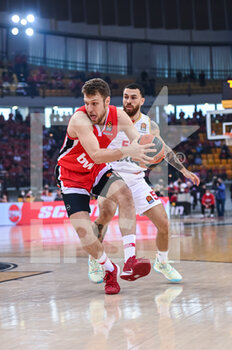 2022-04-22 - Sasha Vezenkov of Olympiacos BC in action against Mike James of AS Monaco Basket during the Turkish Airlines EuroLeague Quorter-Final basketball match between Olympiacos BC and AS Monaco Basket on Apr 22, 2022 at Peace and Friendship Stadium in Athens, Greece - OLYMPIACOS VS AS MONACO - EUROLEAGUE - BASKETBALL
