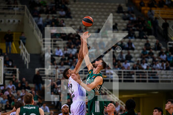 06/10/2022 - Edy Tavares of Real Madrid and Georgios Papagiannis of Panathinaikos BC in action during the Turkish Airlines Euroleague Basketball match between Panathinaikos Athens BC and Real Madrid at OAKA ALTION Arena on October 6, 2022 in Athens, Greece. - PANATHINAIKOS VS REAL MADRID - EUROLEAGUE - BASKET