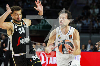 2022-10-27 - Kyle Weems of Bologna and Sergio Llull Melia of Real Madrid during the Turkish Airlines Euroleague basketball match between Real Madrid and Virtus Segafredo Bologna on October 27, 2022 at Wizink Center in Madrid, Spain - BASKETBALL - EUROLEAGUE - REAL MADRID V BOLOGNA - EUROLEAGUE - BASKETBALL