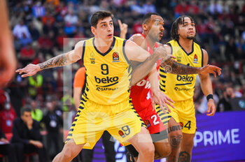 2022-12-13 - #21 JOEL BOLOMBOY of Olympiacos Piraeus with #9 SAMET GEYIK and #4 CARSEN EDWARDS of Fenerbahce during the Turkish Airlines Euroleague match between Olympiacos Piraeus and Fenerbahce Beko Istanbul at Peace and Friendship Stadium on December 13, 2022 in Piraeus, Greece - OLYMPIACOS PIRAEUS VS FENERBAHCE BEKO ISTANBUL - EUROLEAGUE - BASKETBALL