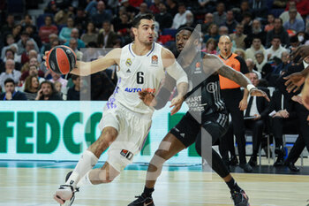 2022-12-22 - Alberto Abalde of Real Madrid and Jonah Mathews of Asvel Lyon-Villeurbanne during the Turkish Airlines Euroleague basketball match between Real Madrid and ASVEL Lyon-Villeurbanne on December 22, 2022 at Wizink Center in Madrid, Spain - BASKETBALL - EUROLEAGUE - REAL MADRID V ASVEL - EUROLEAGUE - BASKETBALL